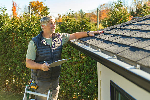 Professional Hail Damage Roof Repair technician working in Carson, CA